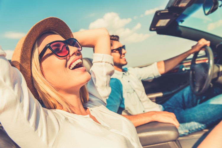 couple driving and having the time of their life