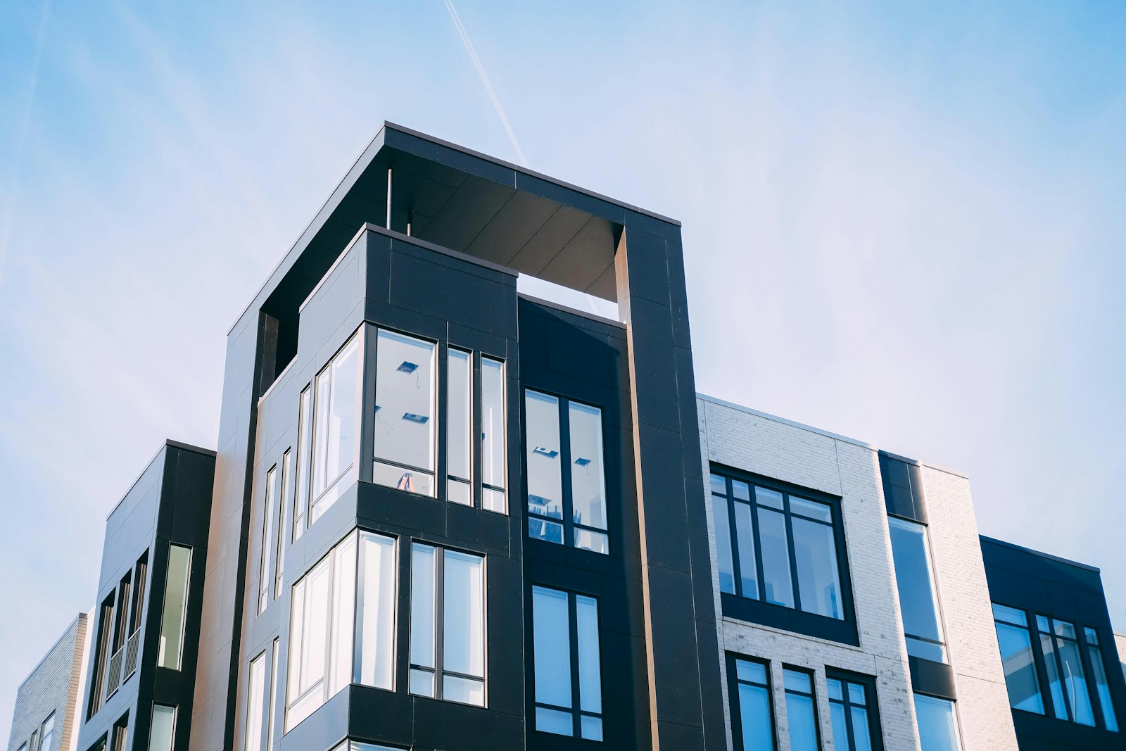 black and white concrete building low-angle photography, renters insurance